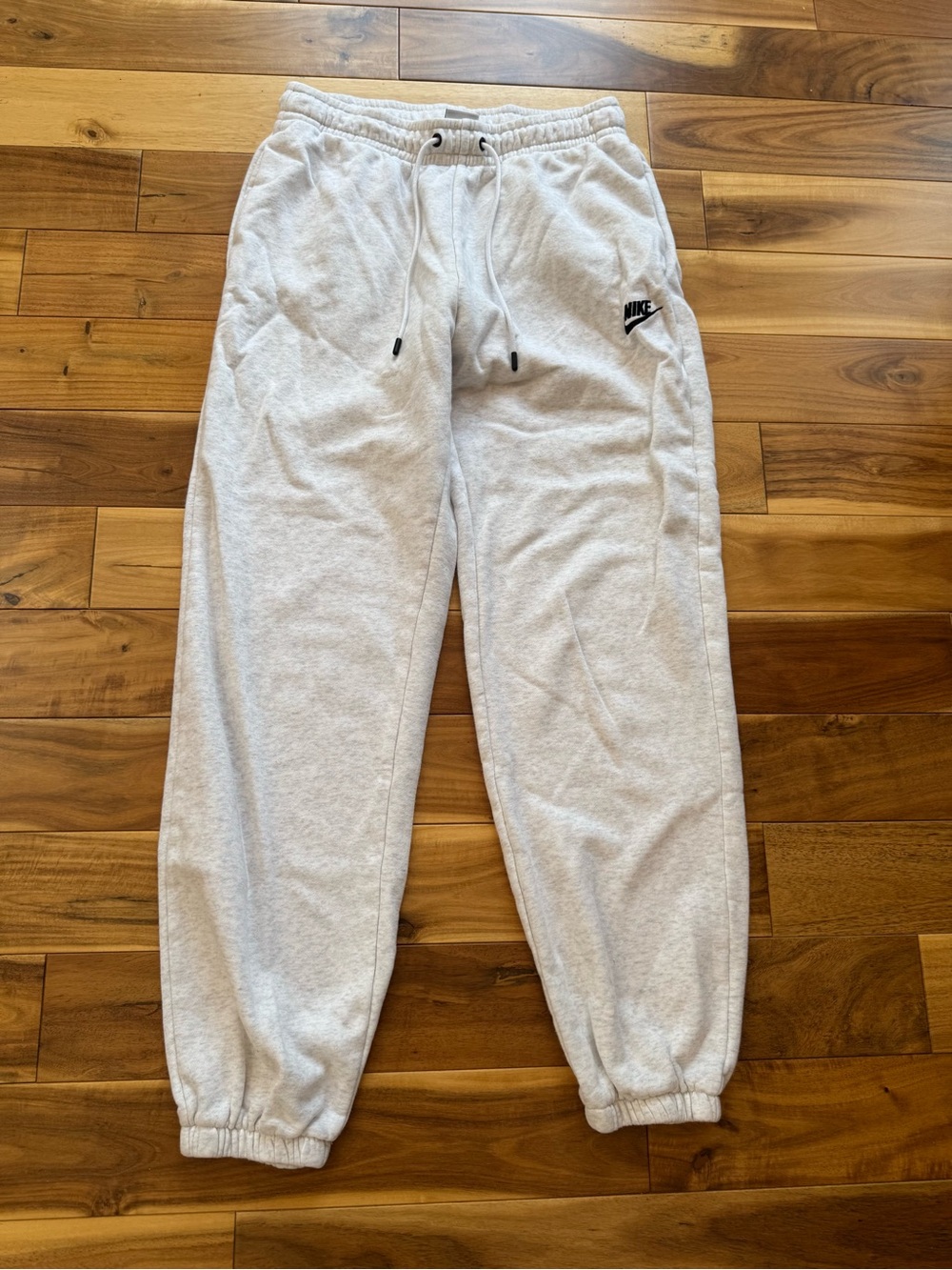 Nike Light Gray Fleece Joggers with Black Logo